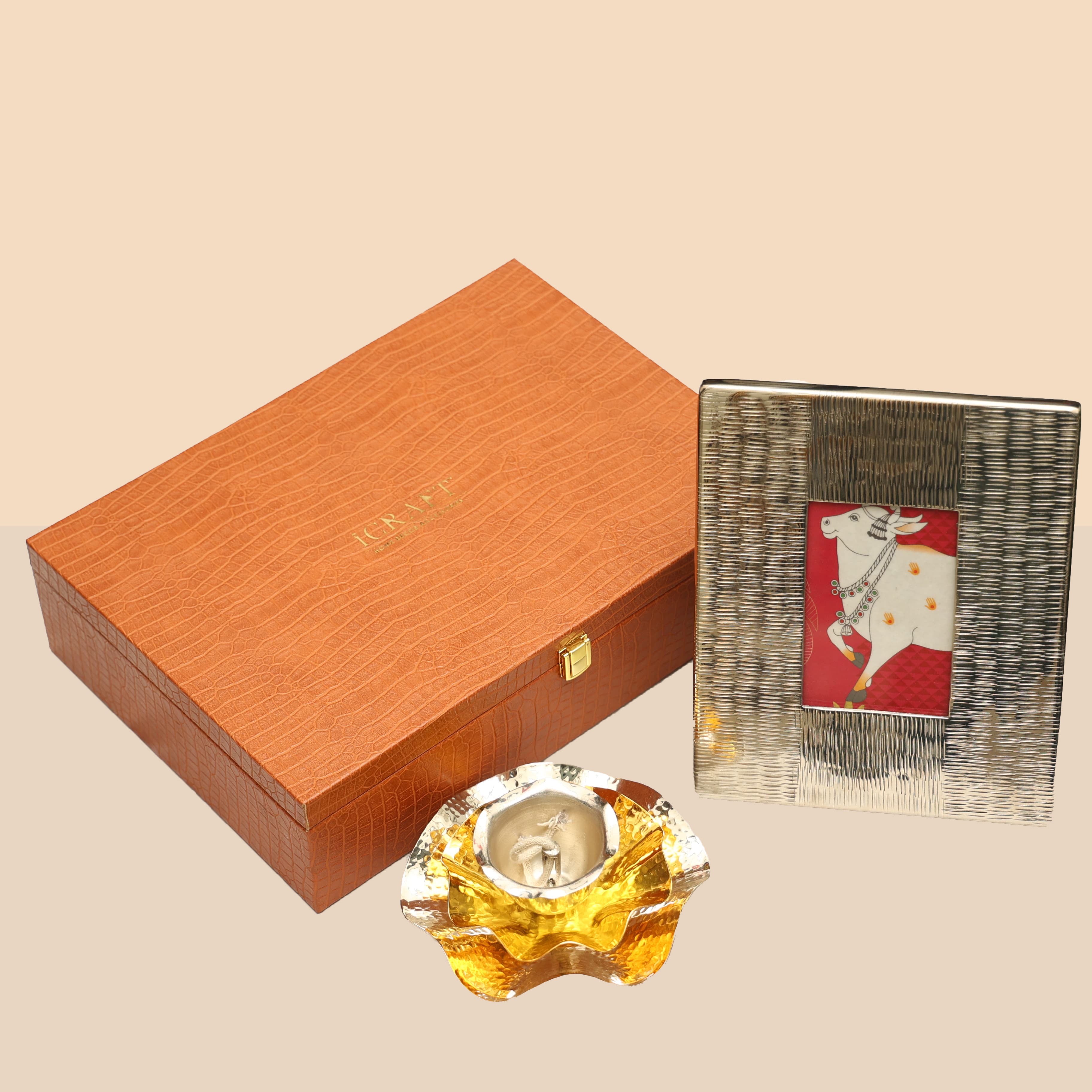 Silver Alu Frame And Layered Diya Hamper