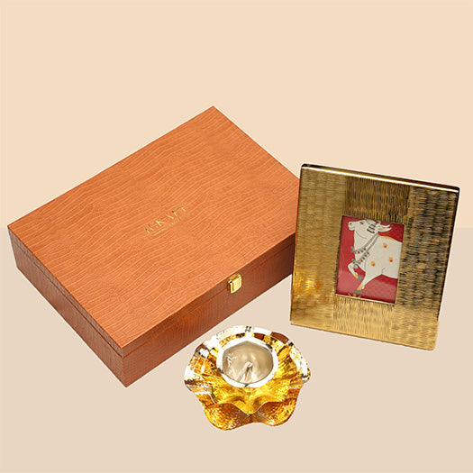 Gold Alu Frame And Layered Diya Hamper