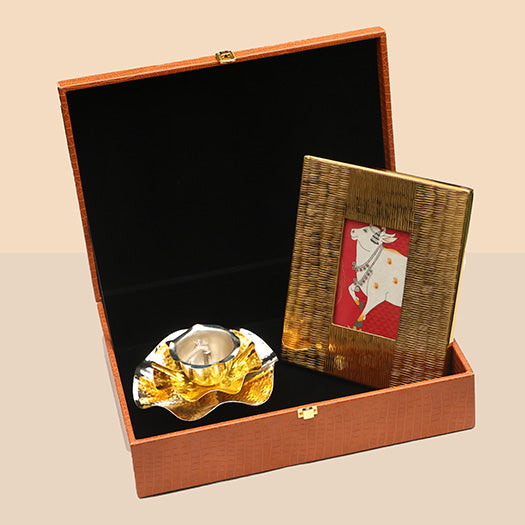 Gold Alu Frame And Layered Diya Hamper